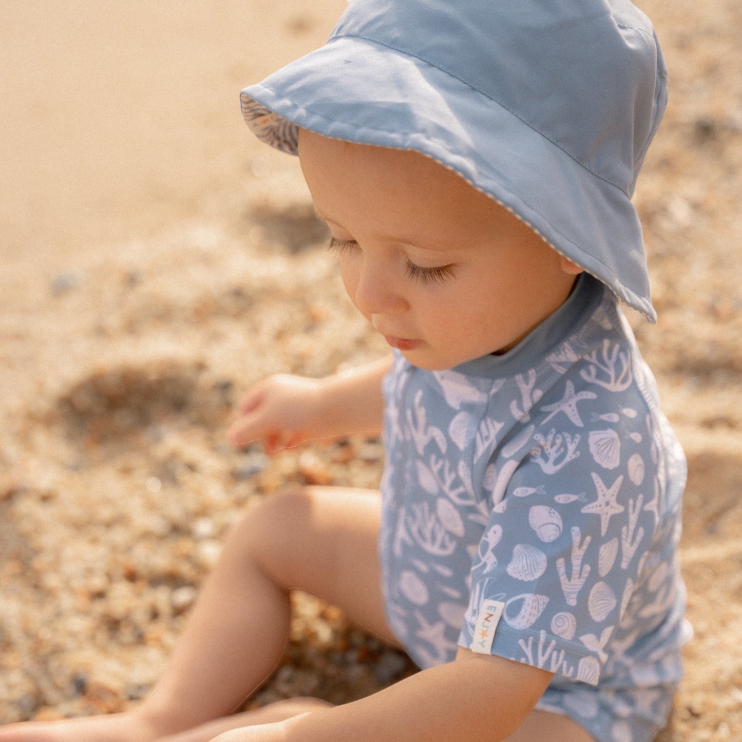 LITTLE DUTCH. Παιδικό καπέλο ήλιου διπλής όψης Stripes Ocean Blue