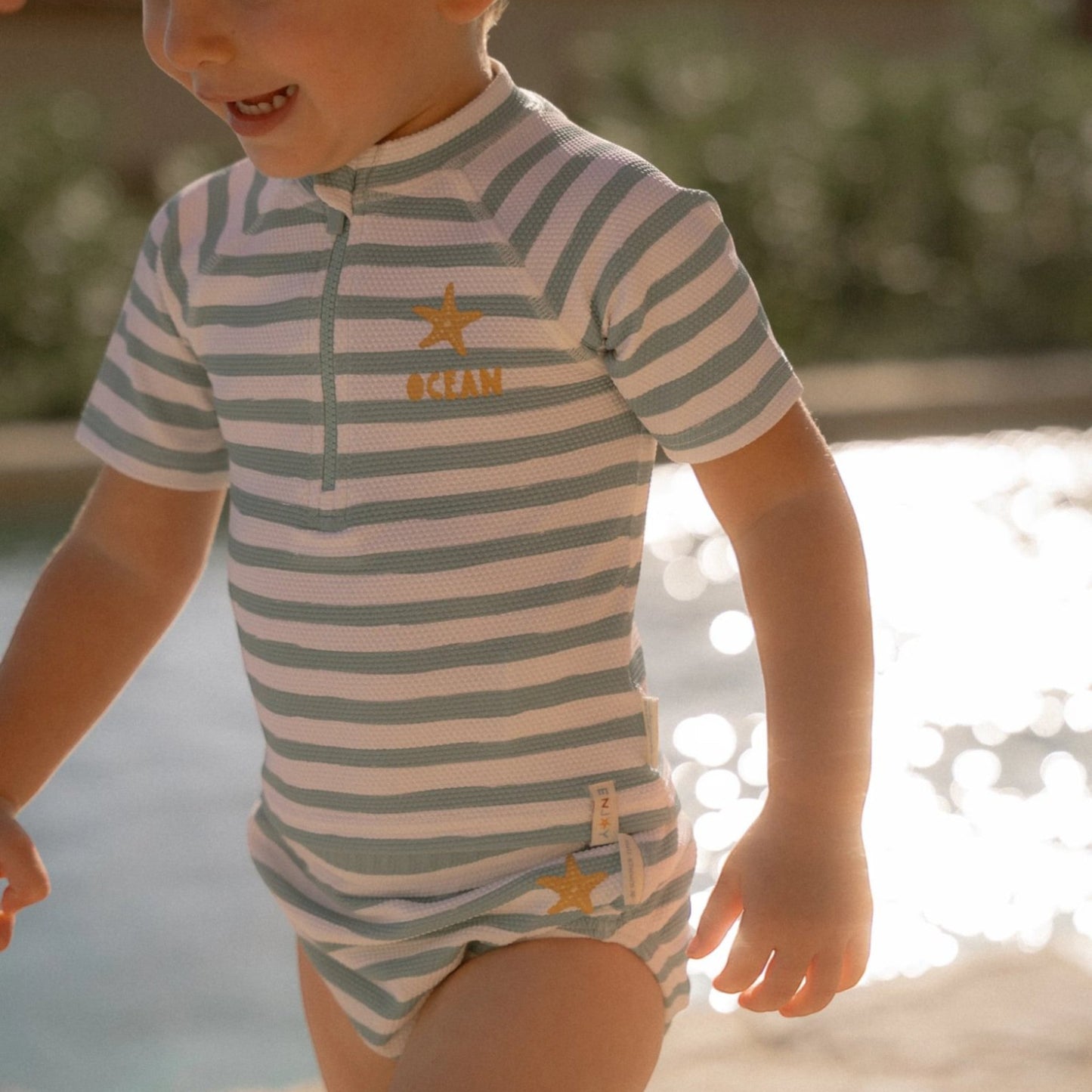 LITTLE DUTCH. Μπλουζάκι κοντομάνικο με προστασία UV Stripes Surf Blue
