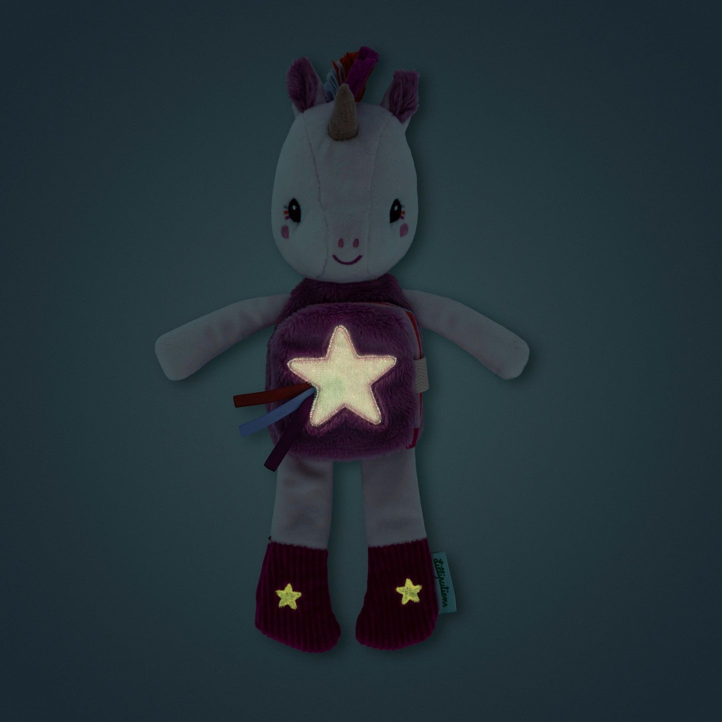 LILLIPUTIENS. Υφασμάτινος μονόκερος που φωσφορίζει με βιβλιαράκι Lena