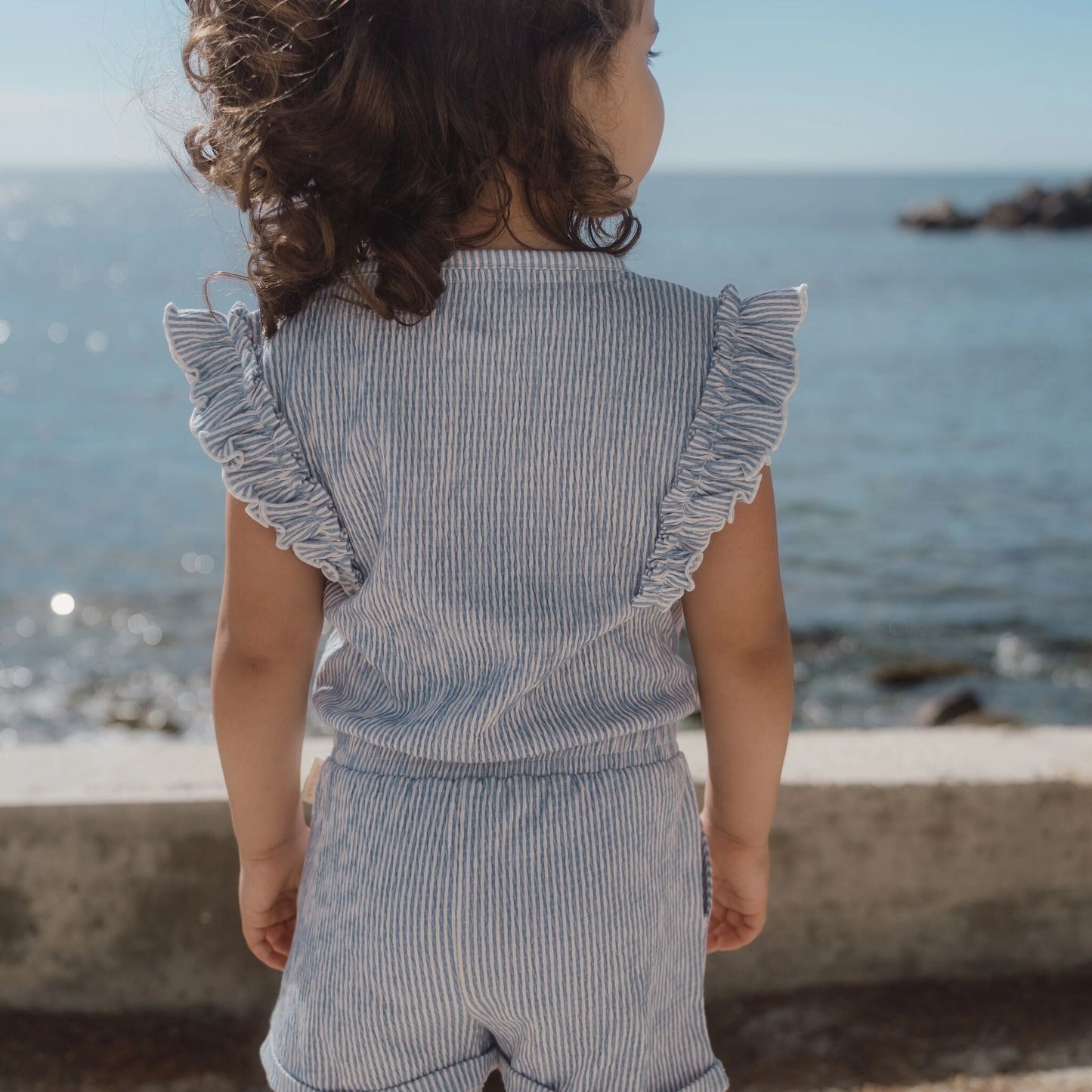 LITTLE DUTCH. Ολόσωμη φόρμα με βολάν Denim Blue Stripe